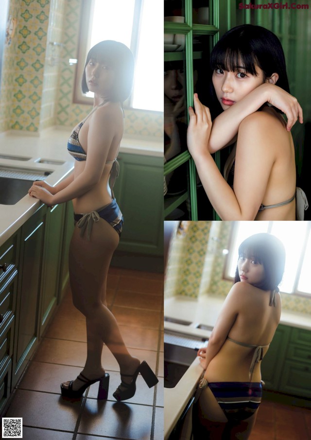 A woman in a bikini standing in a kitchen.