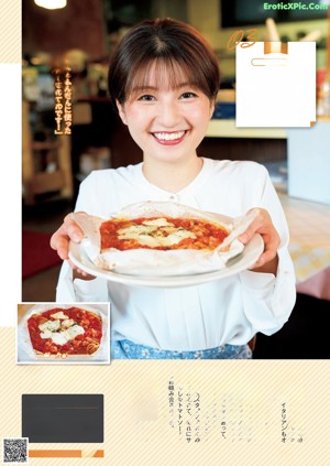 A woman sitting at a table with a bowl of food.