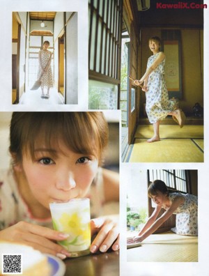 A young woman eating a piece of bread.