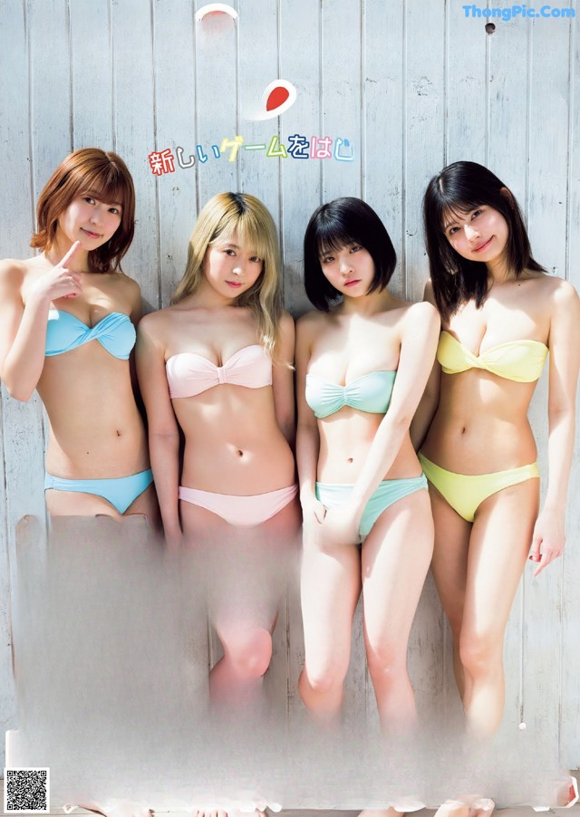 A group of young women in bikinis posing for a magazine cover.